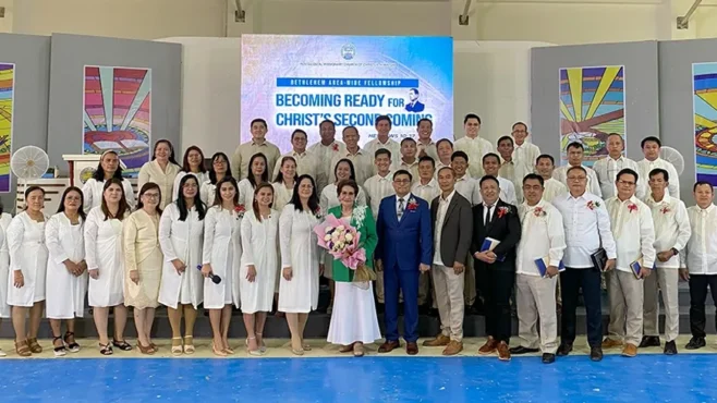 Believers gathered at the AATF Campsite and Prayer Mountain during the Bethlehem Area Fellowship, listening to a message by Leticia S. Ferriol on preparing for Christ’s second coming, with leaders and attendees from various regions worshipping together.